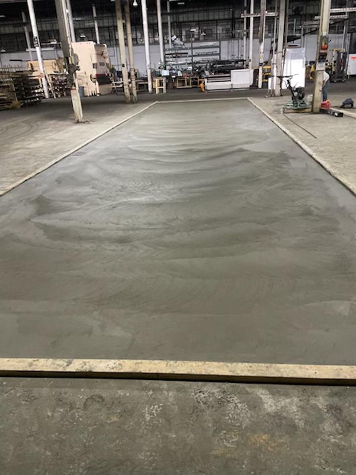 concrete slab in mechanic shop